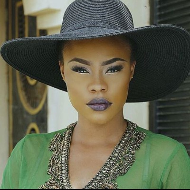 Actress Danielle Okeke matches her Hat to her Lipstick.  PhotoCredit: @DaniellaOkeke