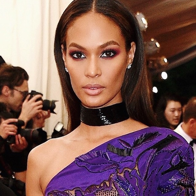 Model Joan Smalls, kept her hair sleek and behind her ears.