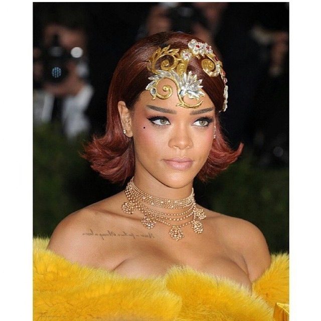 Rihanna was looking very regal with this gold piece